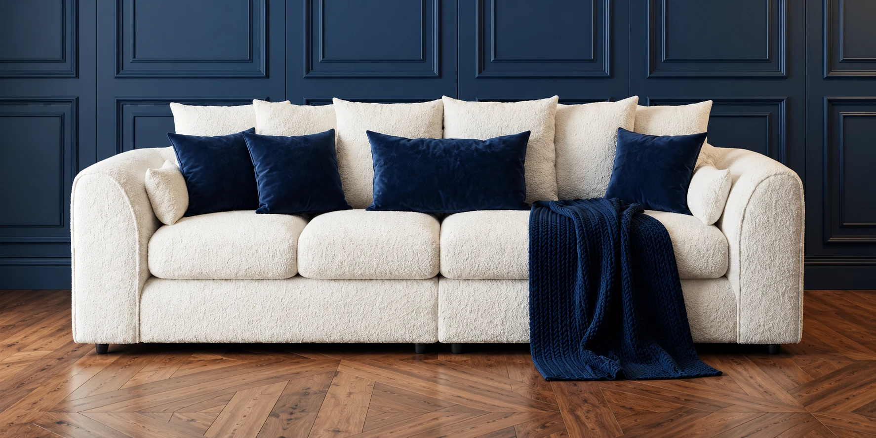 Gamzo Outlet cream sofa with navy cushions